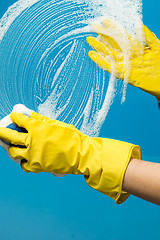 Image showing Man in gloves washes glass