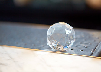 Image showing hand-cut ice ball at bar