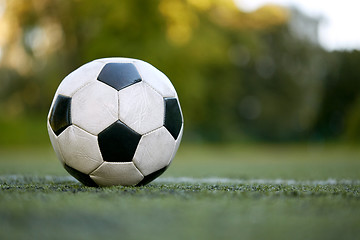 Image showing soccer ball on football field marking line