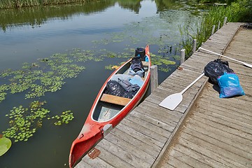 Image showing Canoe on the riverside