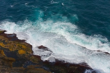 Image showing Waves hitting shore