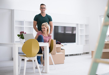 Image showing Young couple moving in a new home