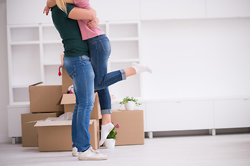 Image showing happy Young couple moving in new house