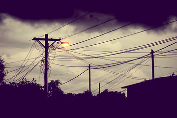 Image showing Street light at night with a stormy sky background