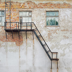 Image showing metal staircase attached to the wall