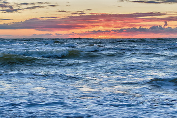 Image showing Sunset At The Stormy Sea