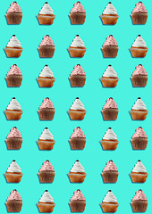 Image showing Colorful pattern made of cupcakes on blue background.