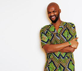 Image showing portrait of young handsome african man wearing bright green nati