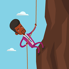 Image showing Businessman climbing on the mountain.