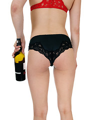 Image showing Woman in panties with wine bottle.