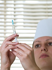 Image showing Nurse with squirt