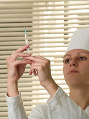 Image showing Nurse with squirt