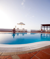 Image showing woman in swimming pool greek islands santorini