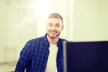 Image showing happy creative man or student at office