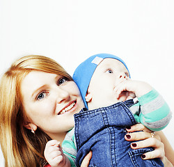 Image showing young beauty mother with cute baby, red head happy modern family