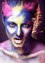 Image showing beauty woman with creative make up like Holy celebration in Indi