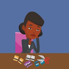 Image showing Business woman bankrupt cutting her credit card.