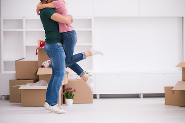 Image showing happy Young couple moving in new house