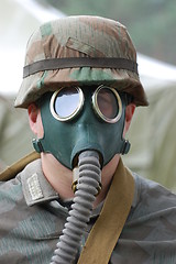 Image showing German soldier in gas mask. WW2 reenacting