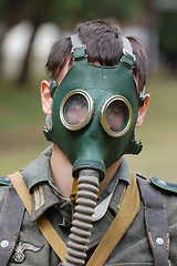 Image showing German soldier in gas mask. WW2 reenacting