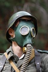 Image showing German soldier in gas mask. WW2 reenacting