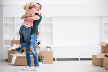 Image showing happy Young couple moving in new house