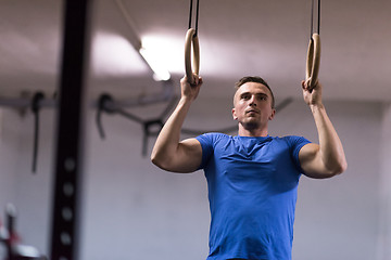 Image showing man doing dipping exercise