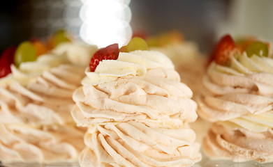 Image showing close up of meringue dessert with berries