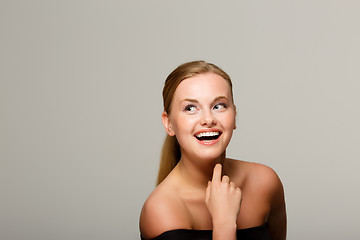 Image showing Smiling woman with bare shoulders