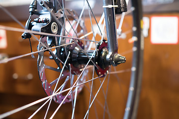 Image showing Bicycle wheel on blurred background