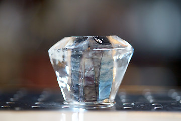 Image showing curved ice cube at bar