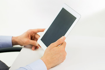 Image showing businessman hands with tablet pc at office