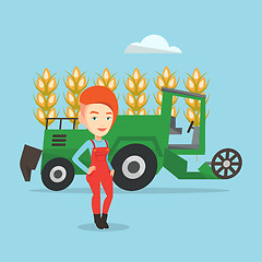 Image showing Farmer standing with combine on background.