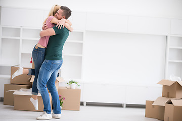 Image showing happy Young couple moving in new house