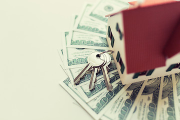 Image showing close up of home model, money and house keys