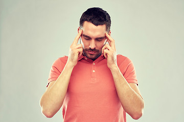 Image showing man suffering from head ache or thinking