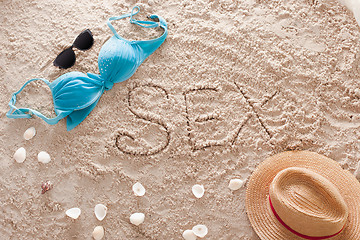 Image showing Sex in a sandy tropical beach