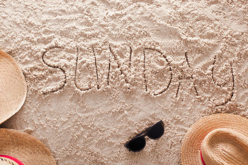 Image showing Sunday written in a sandy tropical beach