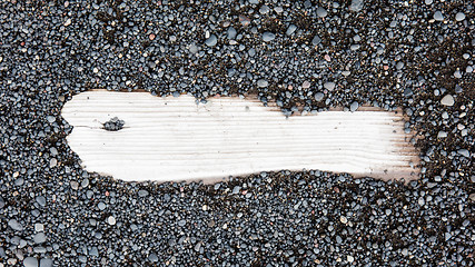 Image showing Sand on planked wood