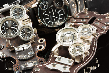 Image showing unusual watches. several alternatives dials