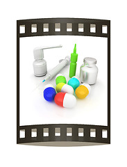 Image showing Syringe, tablet, pill jar. 3D illustration. The film strip