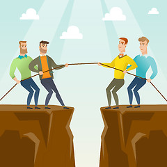 Image showing Two groups of business people pulling rope.