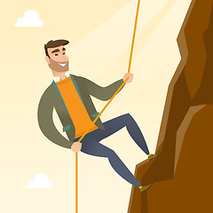 Image showing Business woman climbing on the mountain.