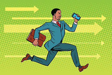 Image showing Businessman with a smartphone running fast forward