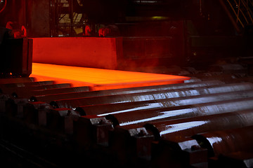 Image showing Hot steel plate on conveyor