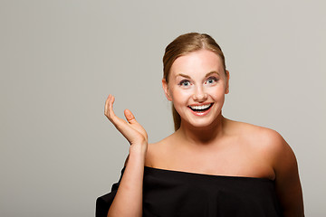 Image showing Smiling model with bare shoulders