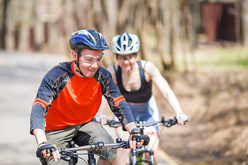 Image showing Woman , man on bike ride