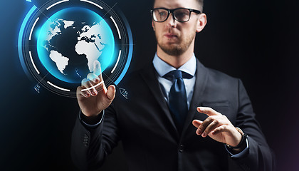 Image showing close up of businessman with earth projection