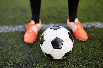 Image showing soccer player playing with ball on football field