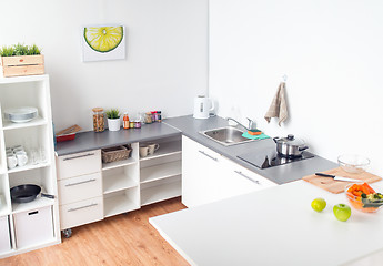 Image showing modern home kitchen interior with food on table